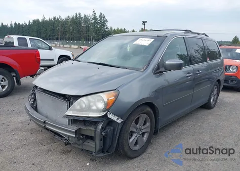 2009 Honda Odyssey Touring z USA, uszkodzony, nr VIN 5FNRL389X9B039650